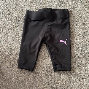 Puma size 3-6 but it’s tiny more like 0-3 black with pink puma